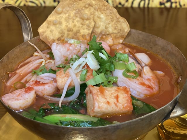 Pink Noodle Soup With Seafood.